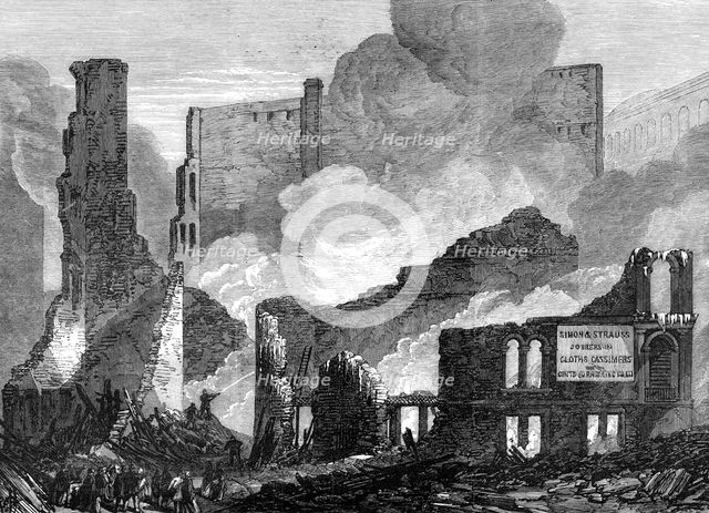 The Great Fire at Chicago: ruins on the south side of Lake-Street, 1868. Creator: Unknown.