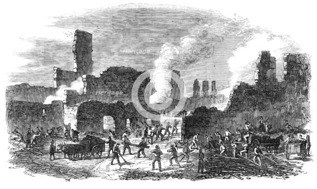 The Great Fire at Limoges, France: firemen and soldiers clearing out a portion of the ruins…, 1864. Creator: Unknown.