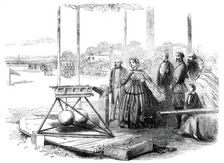 The Great Rifle-shooting Match on Wimbledon Common - Her Majesty firing the first shot, 1860. Creator: Unknown