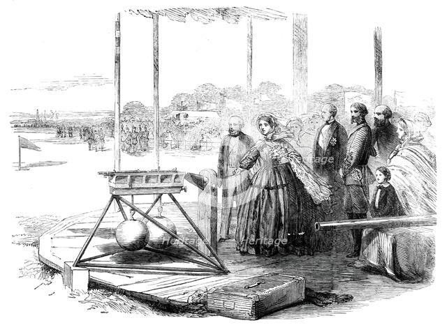 The Great Rifle-shooting Match on Wimbledon Common - Her Majesty firing the first shot, 1860. Creator: Unknown.