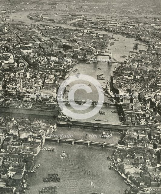 "The Great Street Paved With Water" The Thames from Southwark to Blackwall', 1937. Creator: Aerofilms.