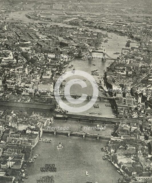 "The Great Street Paved With Water" The Thames from Southwark to Blackwall', 1937. Creator: Aerofilms.
