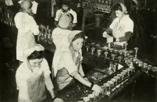 The Great Salmon Industry - Indian girls working in the canning department c1948. Creator: Unknown