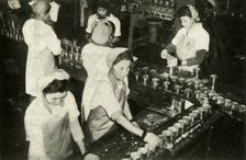 The Great Salmon Industry - Indian girls working in the canning department c1948. Creator: Unknown