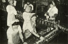The Great Salmon Industry - Indian girls working in the canning department c1948. Creator: Unknown