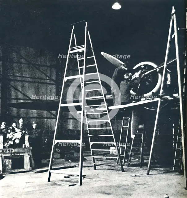 'The ground crew's work is never done', 1941. Artist: Cecil Beaton.