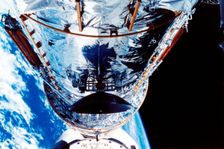 The Hubble Space Telescope orbiting the Earth, c1990s