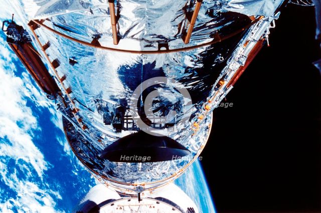 The Hubble Space Telescope orbiting the Earth, c1990s. Artist: Unknown