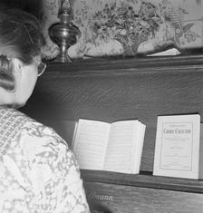 The Hulls have a piano in their one-room basement house, Dead Ox Flat, Malheur County, Oregon, 1939. Creator: Dorothea Lange