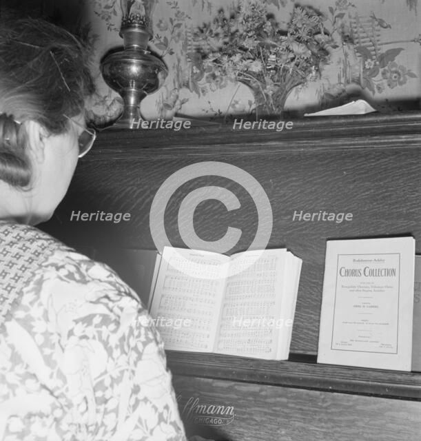 The Hulls have a piano in their one-room basement house, Dead Ox Flat, Malheur County, Oregon, 1939. Creator: Dorothea Lange.
