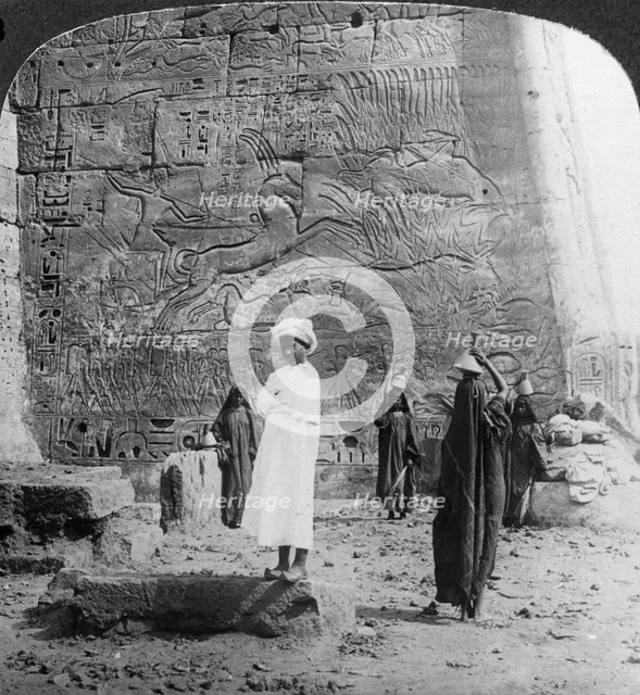 'The hunting of the wild bull, carved on a tempkle wall at Medinet Habu, Thebes, Egypt', 1905.Artist: Underwood & Underwood