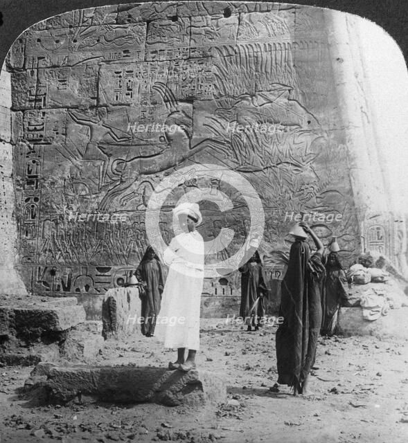 'The hunting of the wild bull, carved on a tempkle wall at Medinet Habu, Thebes, Egypt', 1905.Artist: Underwood & Underwood