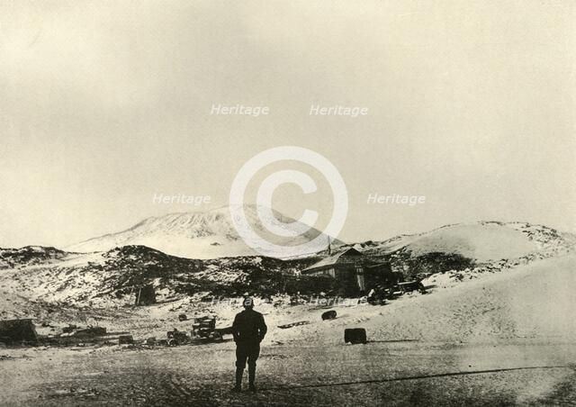 'The Hut, with Mount Erebus in the Background, in the Autumn', 1908, (1909).  Artist: Unknown.