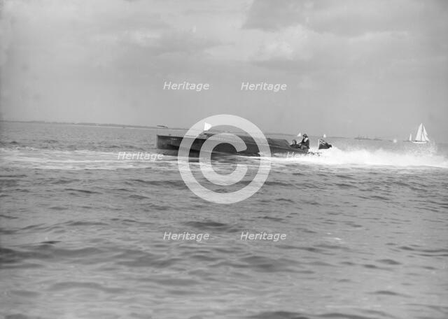 The hydroplane 'Izme' under way, 1913. Creator: Kirk & Sons of Cowes.