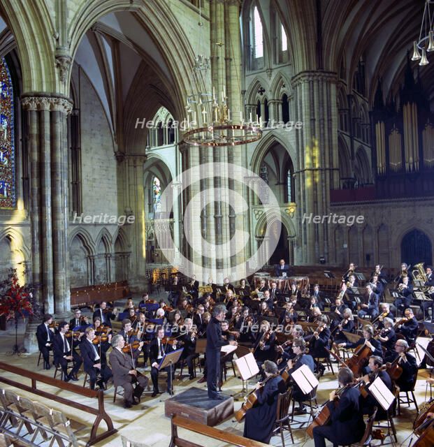The Halle Orchestra in a performance at Lincoln Cathedral, Lincolnshire, 1973. Artist: Michael Walters
