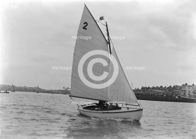 The Hamble River Class 'Dot' (No 2) sailing close-hauled, 1921. Creator: Kirk & Sons of Cowes.