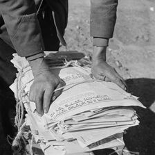 The hands of Mr. Venus Alsobrook, official salvage collector for the..., Washington, D.C., 1942. Creator: Gordon Parks