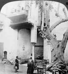 The harem windows in the court of a wealthy Cairene's house, Cairo, Egypt 1905.Artist: Underwood & Underwood