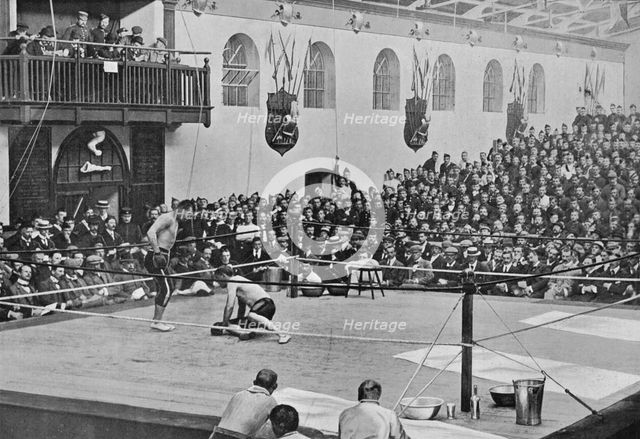 'The Heavyweight Championship at Aldershot', c1901, (1903). Artist: C Knight.