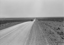 The highway going West, U.S. 80 near Lordsburg, New Mexico, 1938. Creator: Dorothea Lange