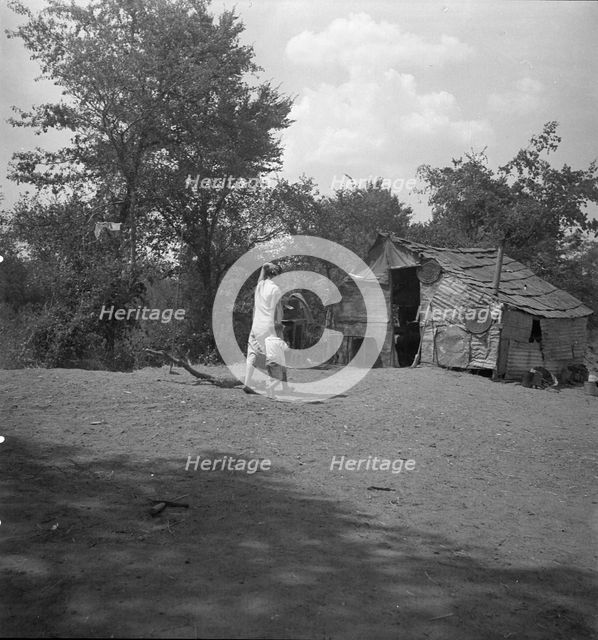 The home of a family in Oklahoma County, Elm Grove, Oklahoma, 1936. Creator: Dorothea Lange.