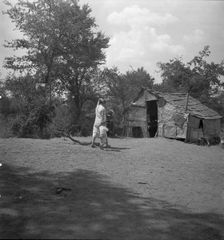 The home of a family in Oklahoma County, Elm Grove, Oklahoma, 1936. Creator: Dorothea Lange