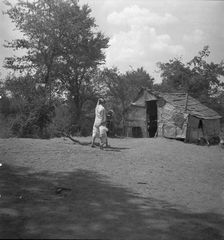 The home of a family in Oklahoma County, Elm Grove, Oklahoma, 1936. Creator: Dorothea Lange