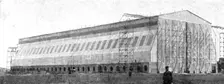 The Home Of "Zeppelin I": The Newly Built Air-Ship Shed..., Near Metz, 1909. Creator: Reclam