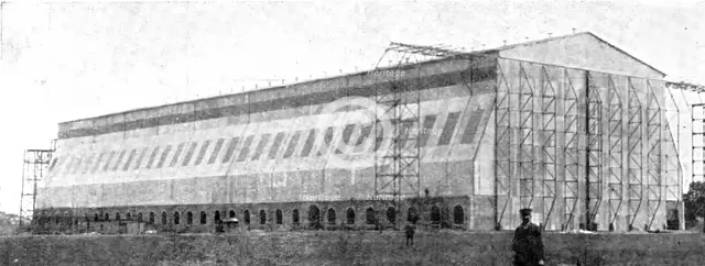 The Home Of "Zeppelin I": The Newly Built Air-Ship Shed..., Near Metz, 1909.  Creator: Reclam.
