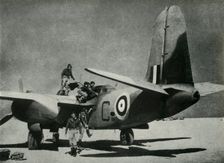 The hot sun streams down on a desert landing ground c1942-1943, (1945). Creator: Unknown