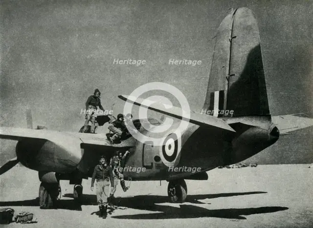 'The hot sun streams down on a desert landing ground', c1942-1943, (1945). Creator: Unknown.