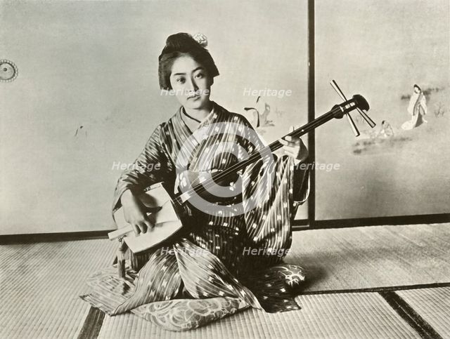'The Indispensible Geisha', 1910. Creator: Herbert Ponting.