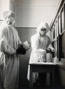 The inoculation of an isolated plague patient in China, c20th century. Creator: Unknown
