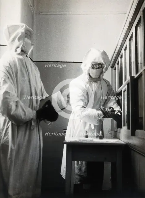 The inoculation of an isolated plague patient in China, c20th century. Creator: Unknown.