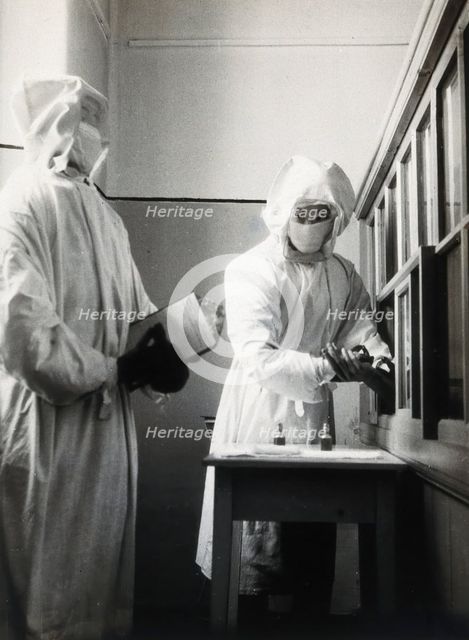 The inoculation of an isolated plague patient in China, c20th century. Creator: Unknown.