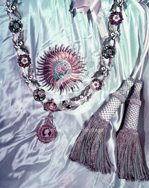 The insignia and robes of the Order of St Patrick, 1953. Creator: Arthur Charles Kirby Ware.