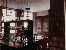 The interior of a pharmaceutical or chemical laboratory with a bench..., c1890s. Creator: Unknown