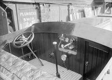 The Interior of a Wolseley launch showing controls and instrument panel. Creator: Kirk & Sons of Cowes