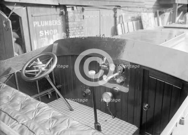The Interior of a Wolseley launch showing controls and instrument panel. Creator: Kirk & Sons of Cowes.