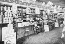 The interior of John Williams & Sons Ltd grocery shop, (early 20th century?). Creator: Unknown