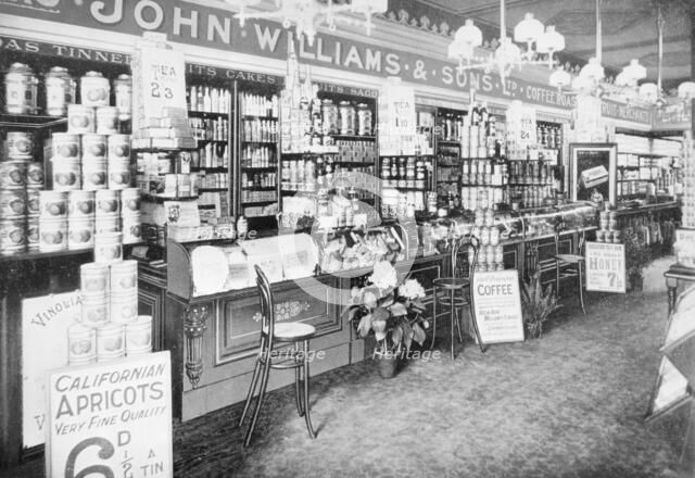 The interior of John Williams & Sons Ltd grocery shop, (early 20th century?). Artist: Unknown