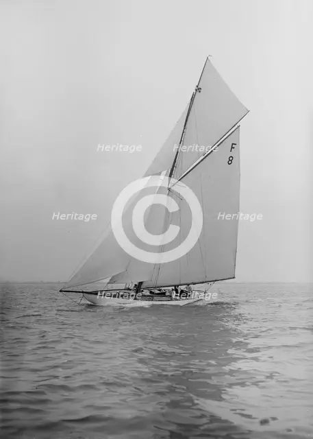 The International 10 Metre class 'Pampero' (F8) sailing close-hauled, 1913. Creator: Kirk & Sons of Cowes.
