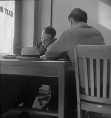 The interview for unemployment compensation, San Francisco, California, 1938. Creator: Dorothea Lange