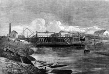 The Inundation in the Fens: the syphon dam of the middle-level drain, 1862. Creator: Unknown