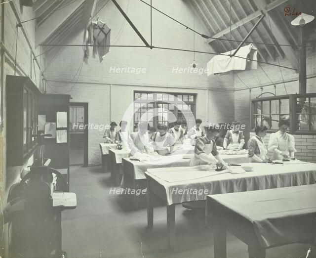 The ironing room, Battersea Polytechnic, London, 1907. Artist: Unknown.