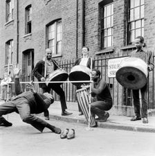 The Irwin Clement Caribbean steel band, possibly in Stalbridge Street, Marylebone, London, 1963. Creator: Henry Grant