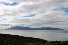 The island of Rum from Skye, Highland, Scotland. Creator: Peter Thompson