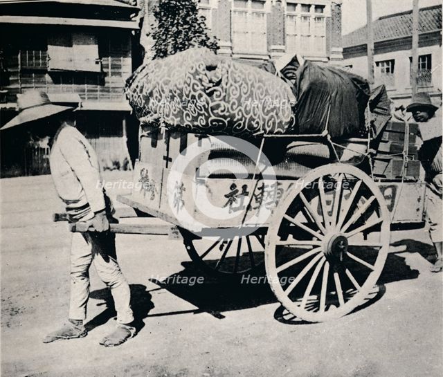 'The Japanese are not slave to possessions. Most can move house by hand-cart', c1900, (1921).  Artist: Julian Leonard Street.