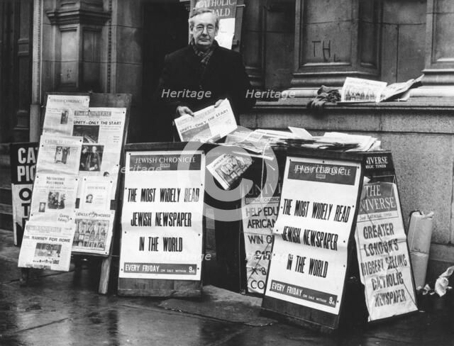 The Jewish Chronicle on sale outside Westminster Cathedral, London, 1966. Artist: EH Emanuel
