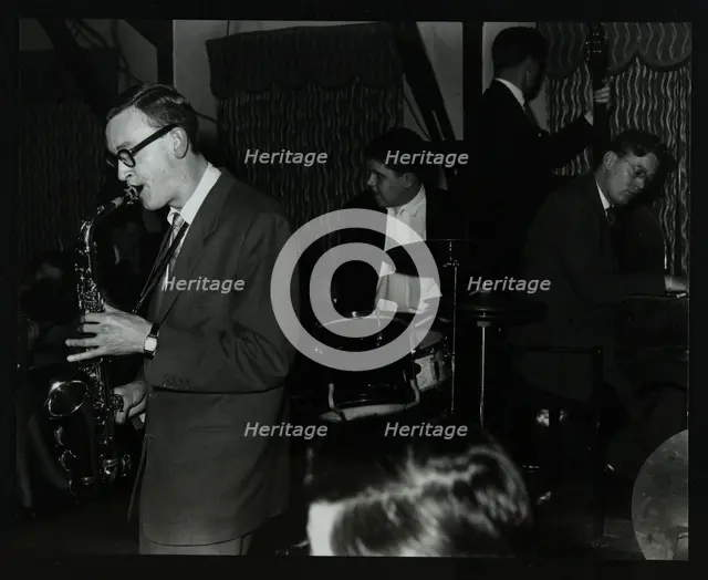 The John Cox Trio and Derek Humble playing at the Civic Restaurant, Bristol, 1955.  Creator: Denis Williams.